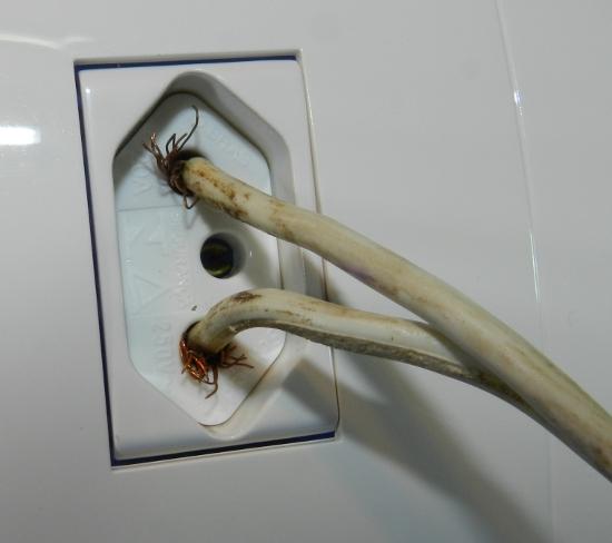 troca de tomadas queimada
